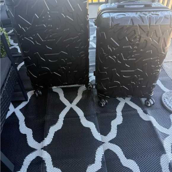 Sleek Black Embossed Suitcase
